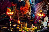 Worship and puja offerings inside the Swamimalai temple. 